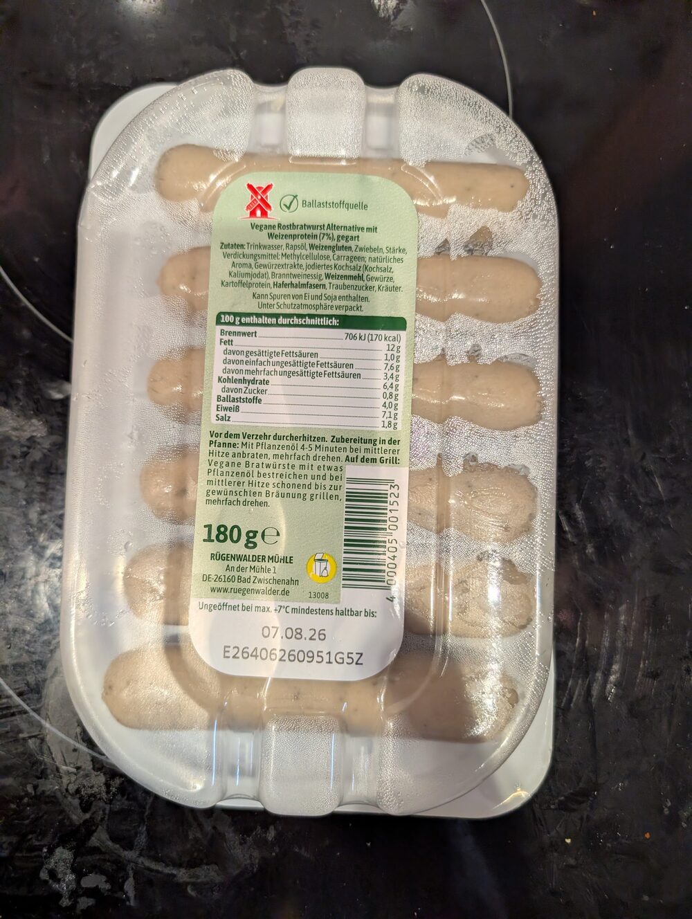 Back of the Rügenwalder Mühle Vegane Rostbratwürstchen packaging, showing ingredients and nutrition